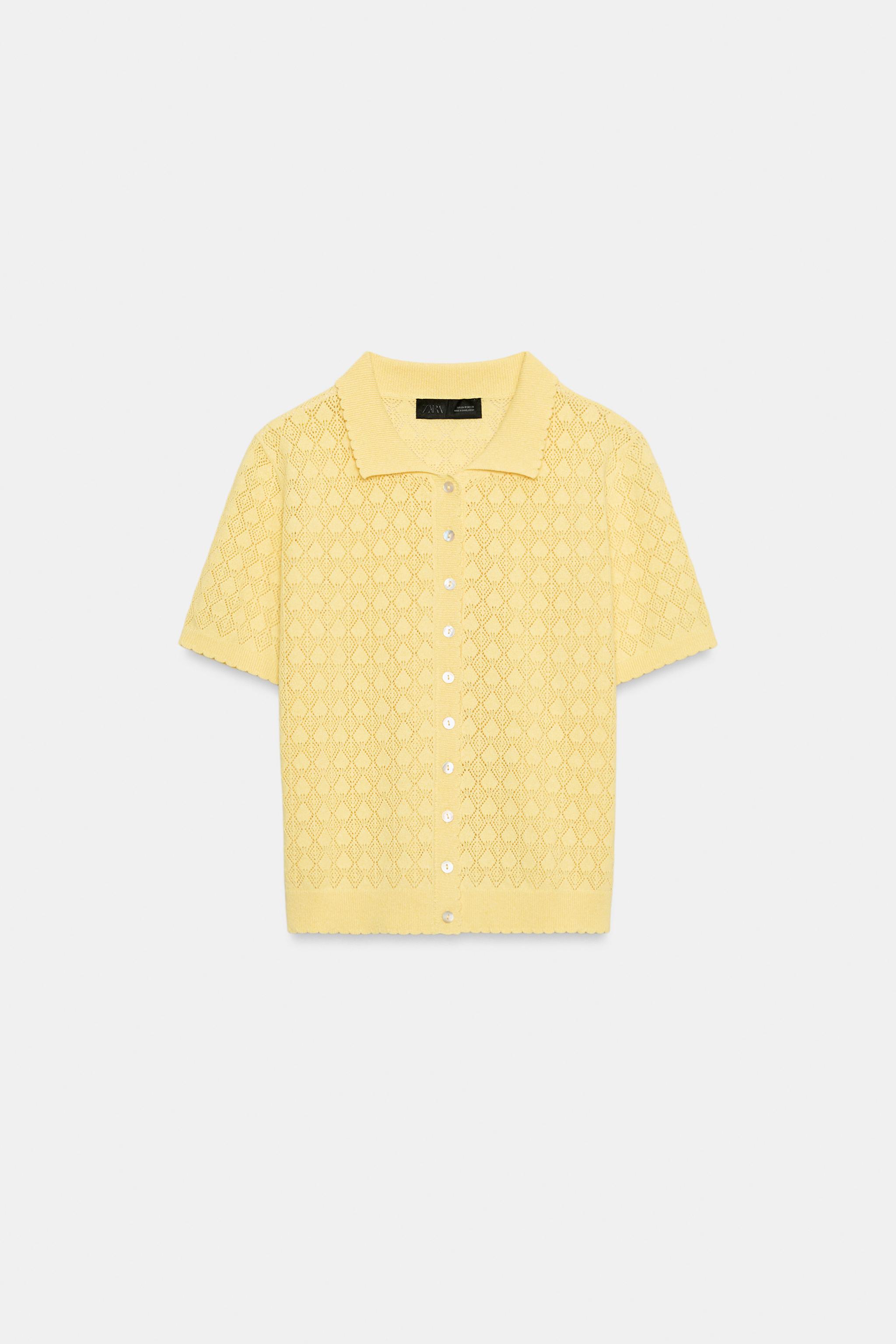 GILET POLO EN MAILLE À MANCHES COURTES